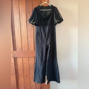 Katakomb Black Jumpsuit with Sheer Sleeves.